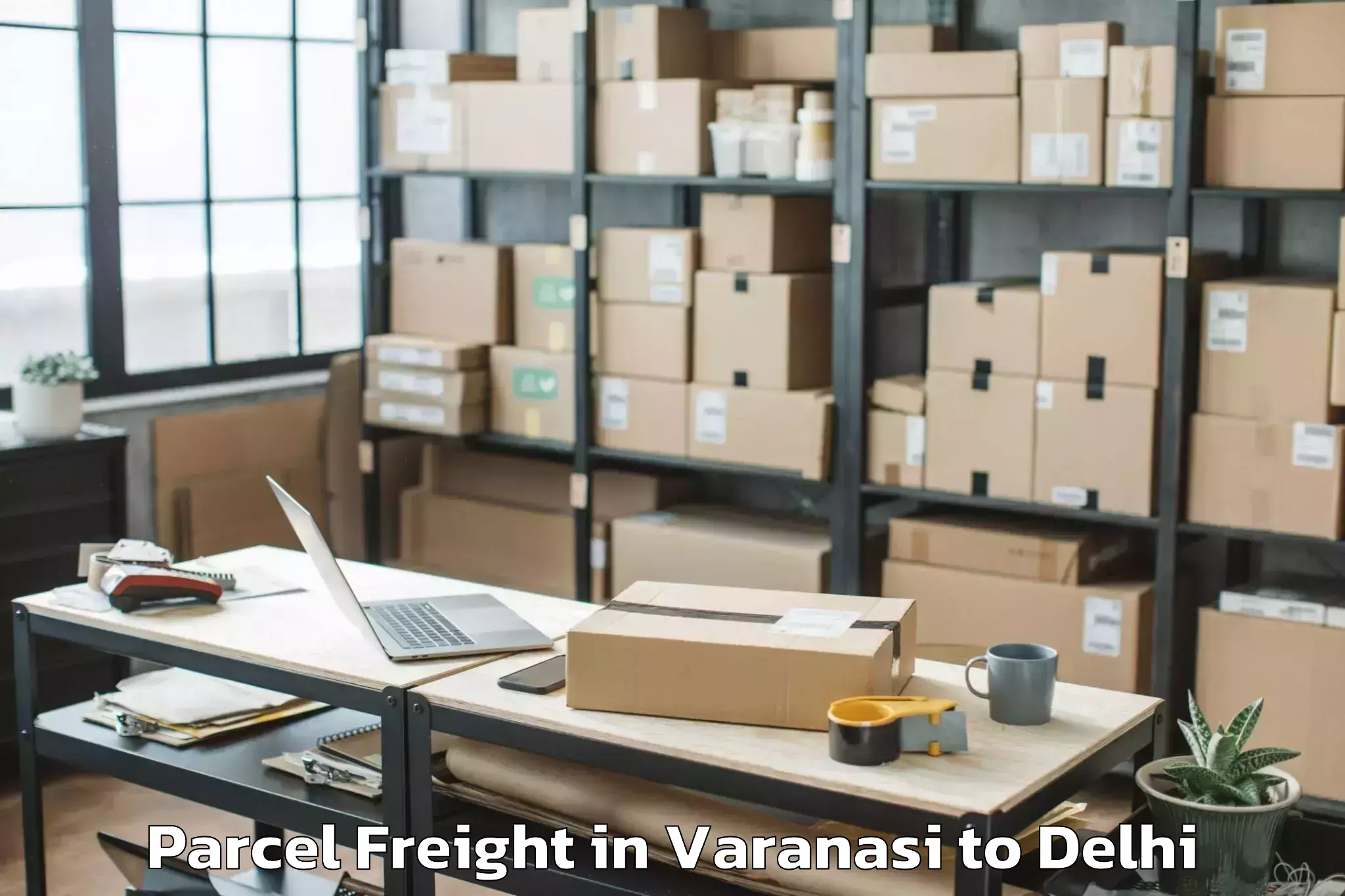 Book Varanasi to Sarojini Nagar Parcel Freight Online